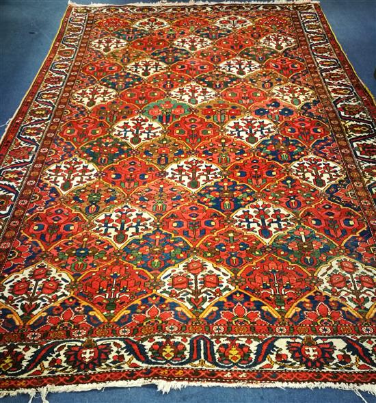 A Hamadan red ground carpet 300 x 214cm